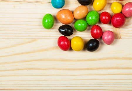 Christmas wooden background with candies.の写真素材