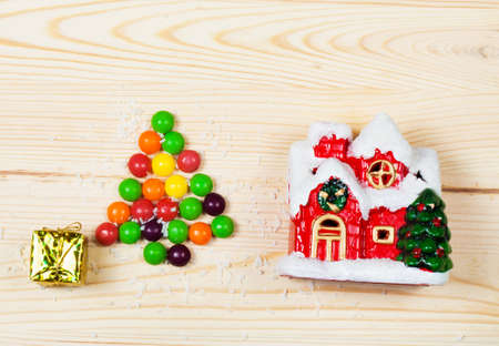 Christmas wooden background with candies.の写真素材