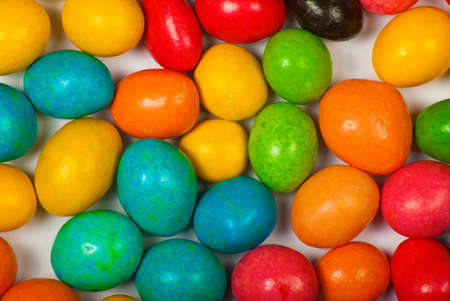 Close up of a pile of colorful chocolate coated candyの写真素材