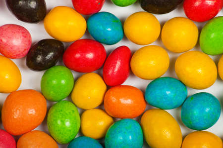 Close up of a pile of colorful chocolate coated candyの写真素材