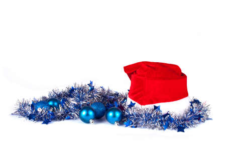 Christmas decorations with red hat on white backgroundの写真素材