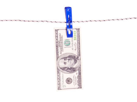 One hundred dollar bill hanging on a clothes pinsの写真素材