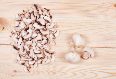 Many mushrooms on wooden table. Top view .の写真素材
