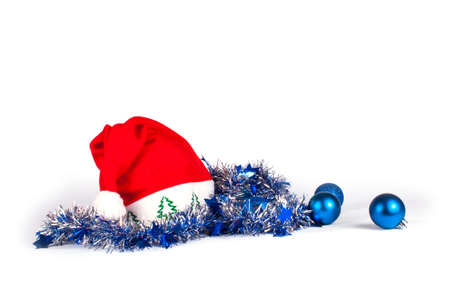 Christmas decorations with santa hat on whiteの写真素材