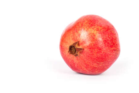 ripe sweet pomegranate isolated on white
