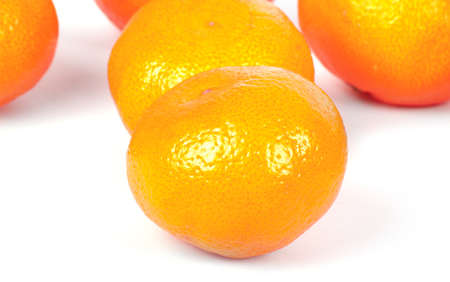 Ripe mandarins isolated on a white backgroundの写真素材