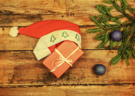 Christmas decorations with santa hat on whiteの写真素材