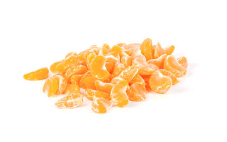 Mandarine slice (heap) isolated on white backgroundの写真素材