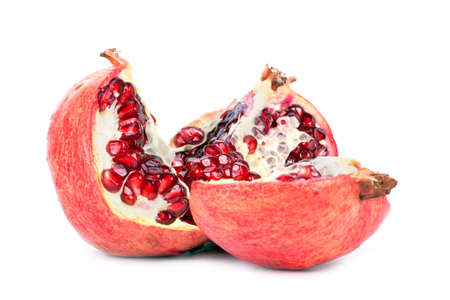 Ripe pomegranate fruit with half isolated on white backgroundの写真素材