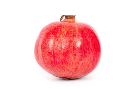 Ripe pomegranate fruit with half isolated on white backgroundの写真素材