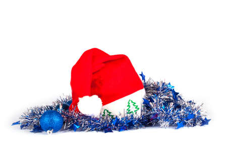 Christmas decorations with santa hat on whiteの写真素材