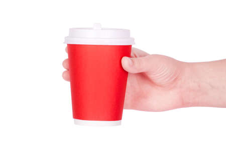 Disposable red cup of coffee in handの写真素材