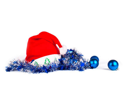 Christmas decorations with santa hat on whiteの写真素材