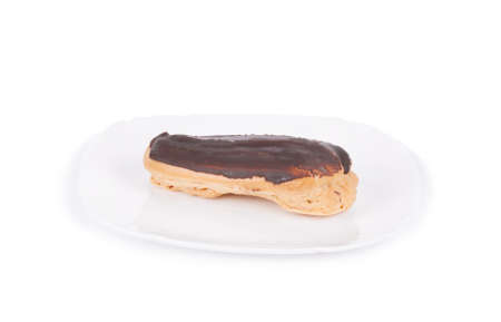 Cake eclair isolated on white backgroundの写真素材