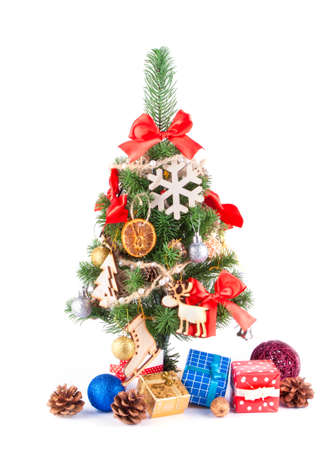 Decorated Christmas tree on white backgroundの写真素材