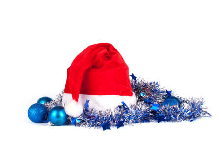 Christmas decorations with santa hat on whiteの写真素材