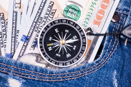 Passport with money and things closeup