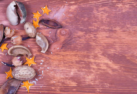 Christmas background with snowflakes and decoration on wooden table. Copy space. Top view