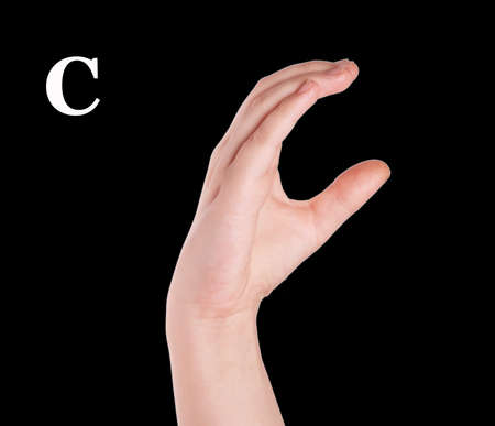 Finger Spelling the Alphabet in American Sign Language (ASL). The Letter Oの写真素材