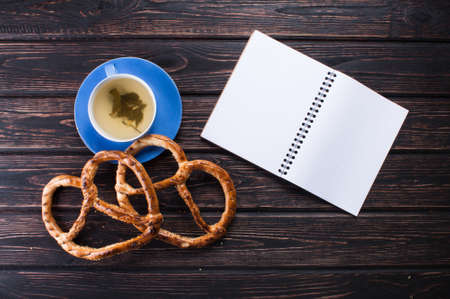 Bavarian pretzels on wooden board.の写真素材