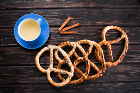 Bavarian pretzels on wooden board.の写真素材