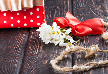 snowdrops bunch on wooden backgroundの写真素材