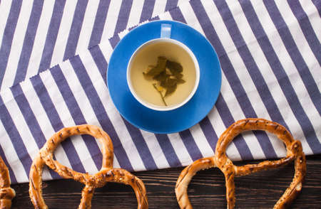 Bavarian pretzels on wooden board.の写真素材