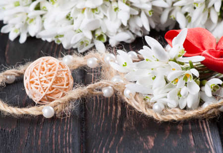 snowdrops bunch on wooden backgroundの写真素材