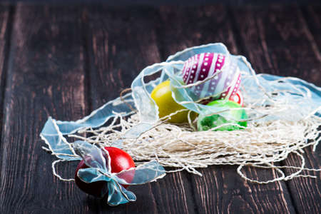 Easter eggs on wooden backgroundの写真素材