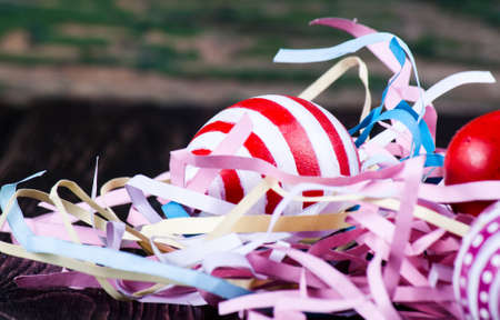 Easter eggs on wooden backgroundの写真素材