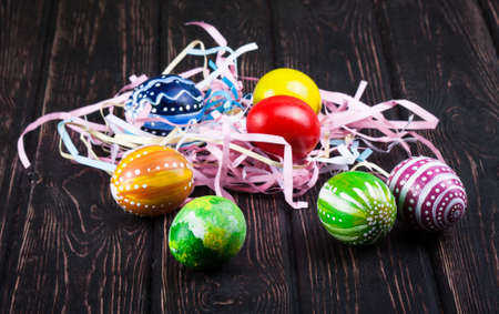 Easter eggs on wooden background