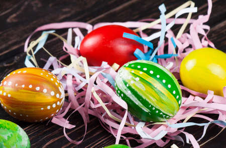 Easter eggs on wooden backgroundの写真素材