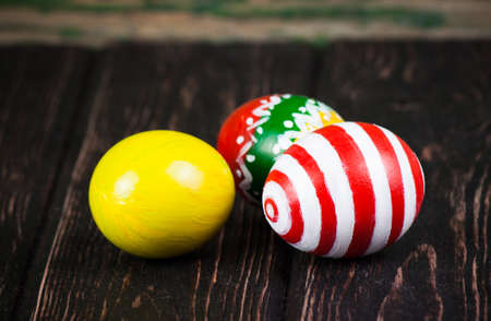 Easter eggs on wooden backgroundの写真素材