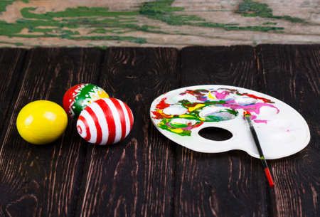 Easter eggs on wooden backgroundの写真素材