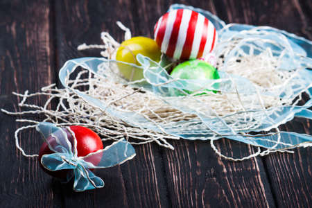 Easter eggs on wooden backgroundの写真素材