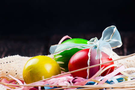 Easter eggs on wooden backgroundの写真素材