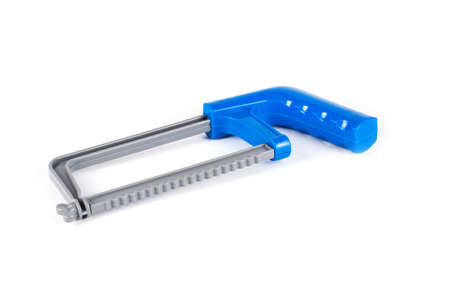 Toy saw on a white background. Children toy toolsの写真素材