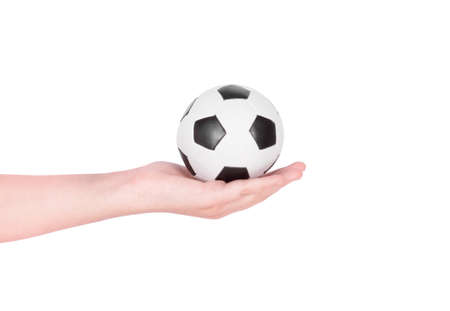Soccer ball on hand. Little soccer ballの写真素材