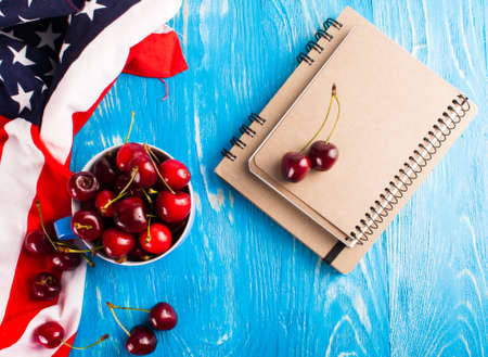 Cherry isolated on wood desk. Fresh cherryの写真素材