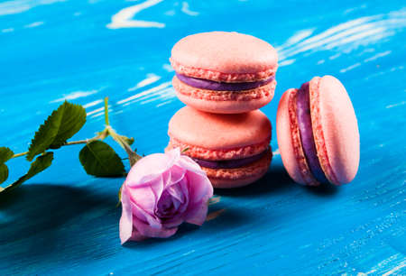 Multicolored macaroon on brown boards. Bakery products. Dessertの写真素材