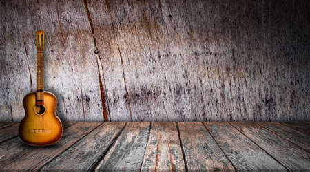 Guitar in the interior of a vintage concert hallの写真素材