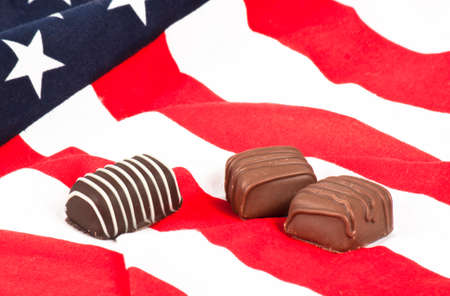 Chocolate candy on American flag.の写真素材