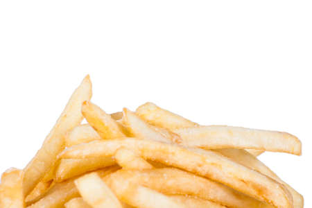pile of appetizing french fries on a white background
