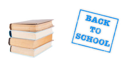 Stack of old books with stamp back to school. Education