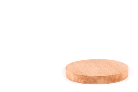 Round wooden board on white backgroundの写真素材