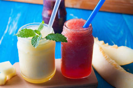 Smoothies Melon on blue wooden boards. supply methodの写真素材