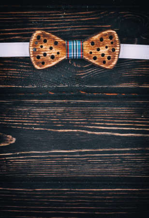 Stylish wooden bow tie on the boardsのeditorial素材