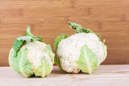 Ripe cauliflower on wood shelf. Food ingredientの写真素材