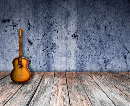 Guitar in the interior of a vintage concert hallの写真素材