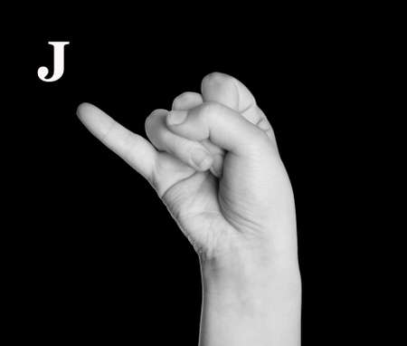 The Letter J. Finger Spelling the Alphabet in American Sign Language (ASL).の写真素材